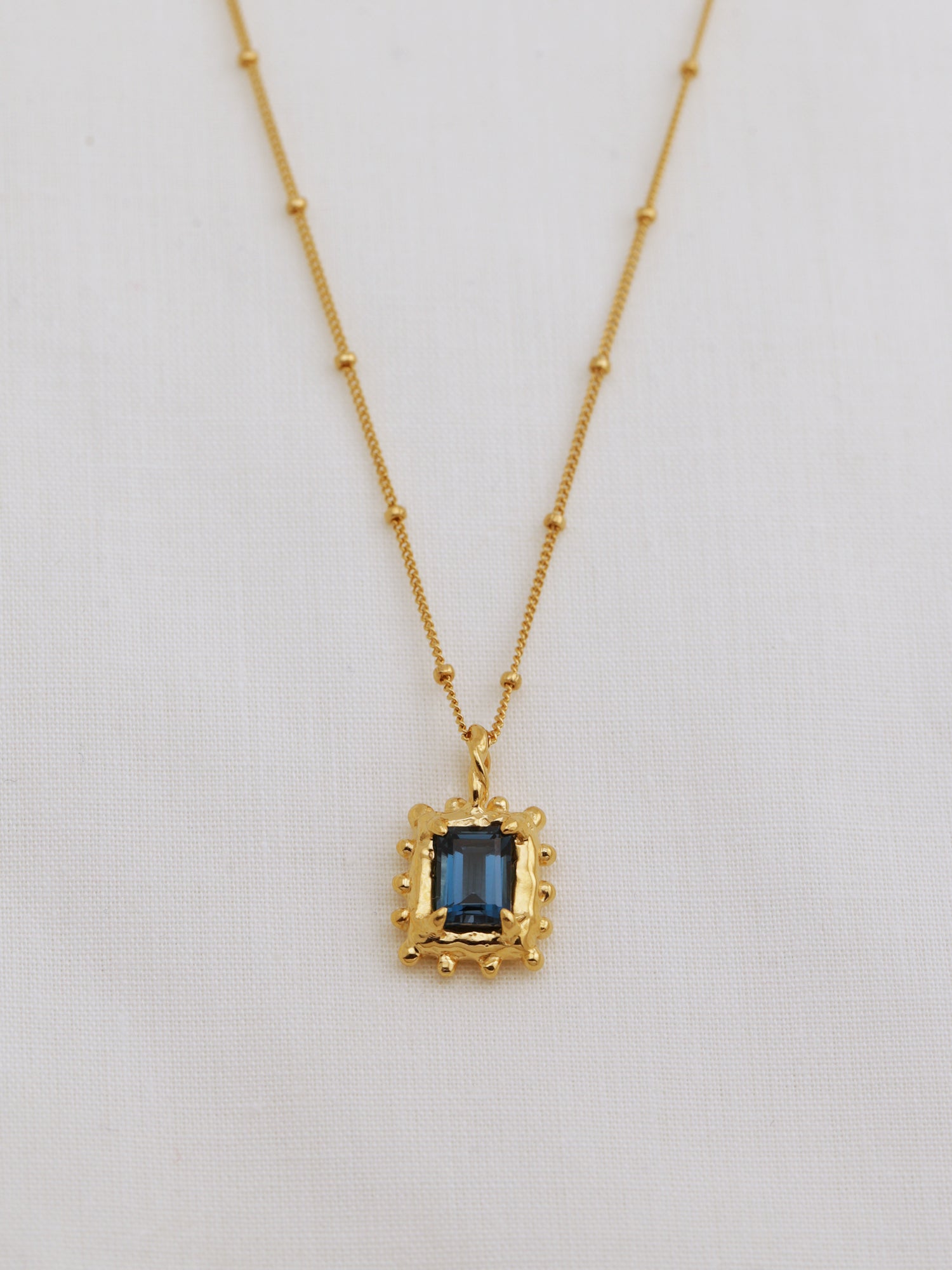 Memento Necklace with Dark Blue Topaz