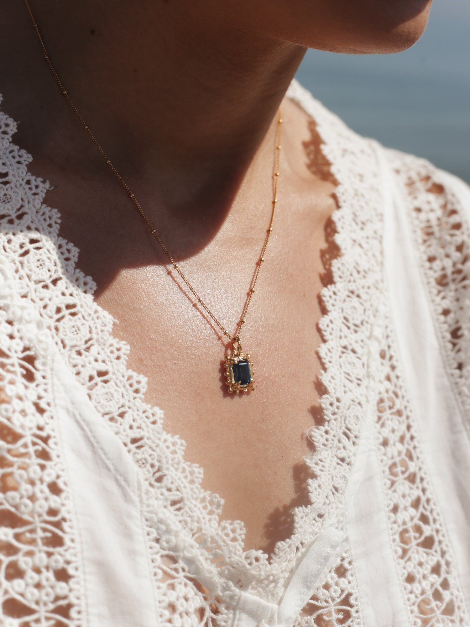 Memento Necklace with Dark Blue Topaz
