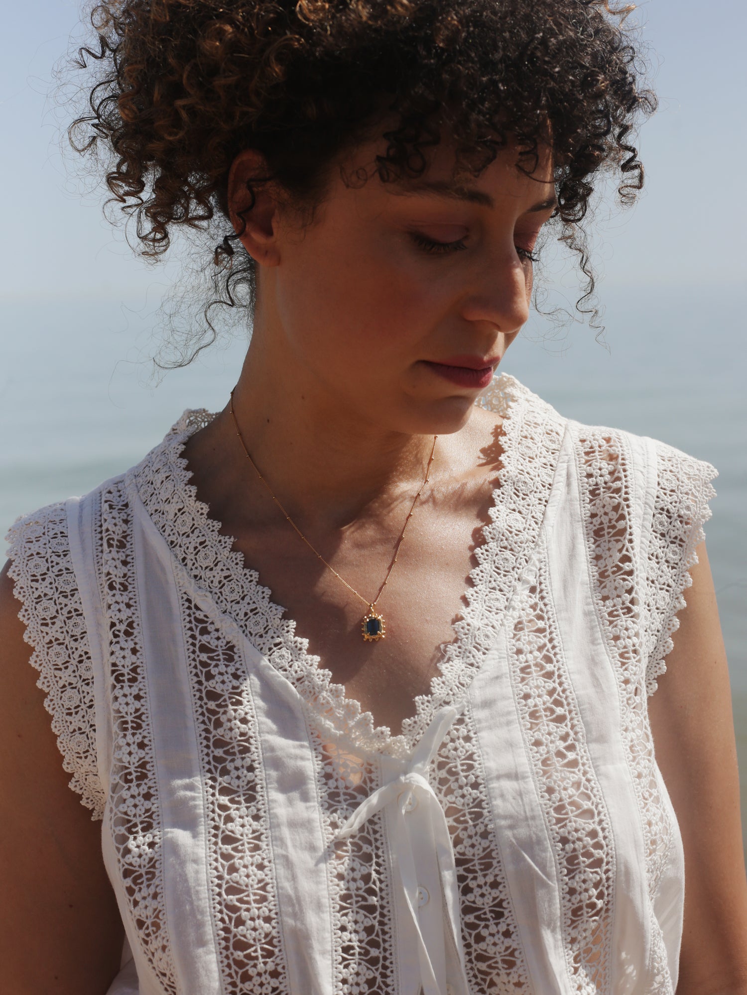 Memento Necklace with Dark Blue Topaz