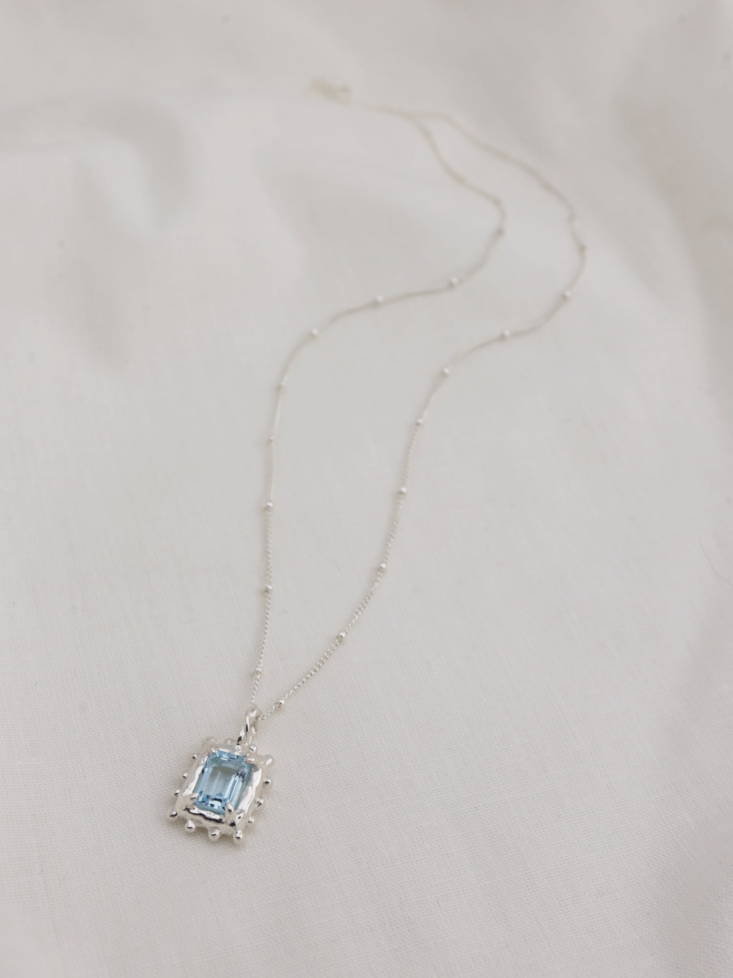 Memento Necklace with Sky Topaz