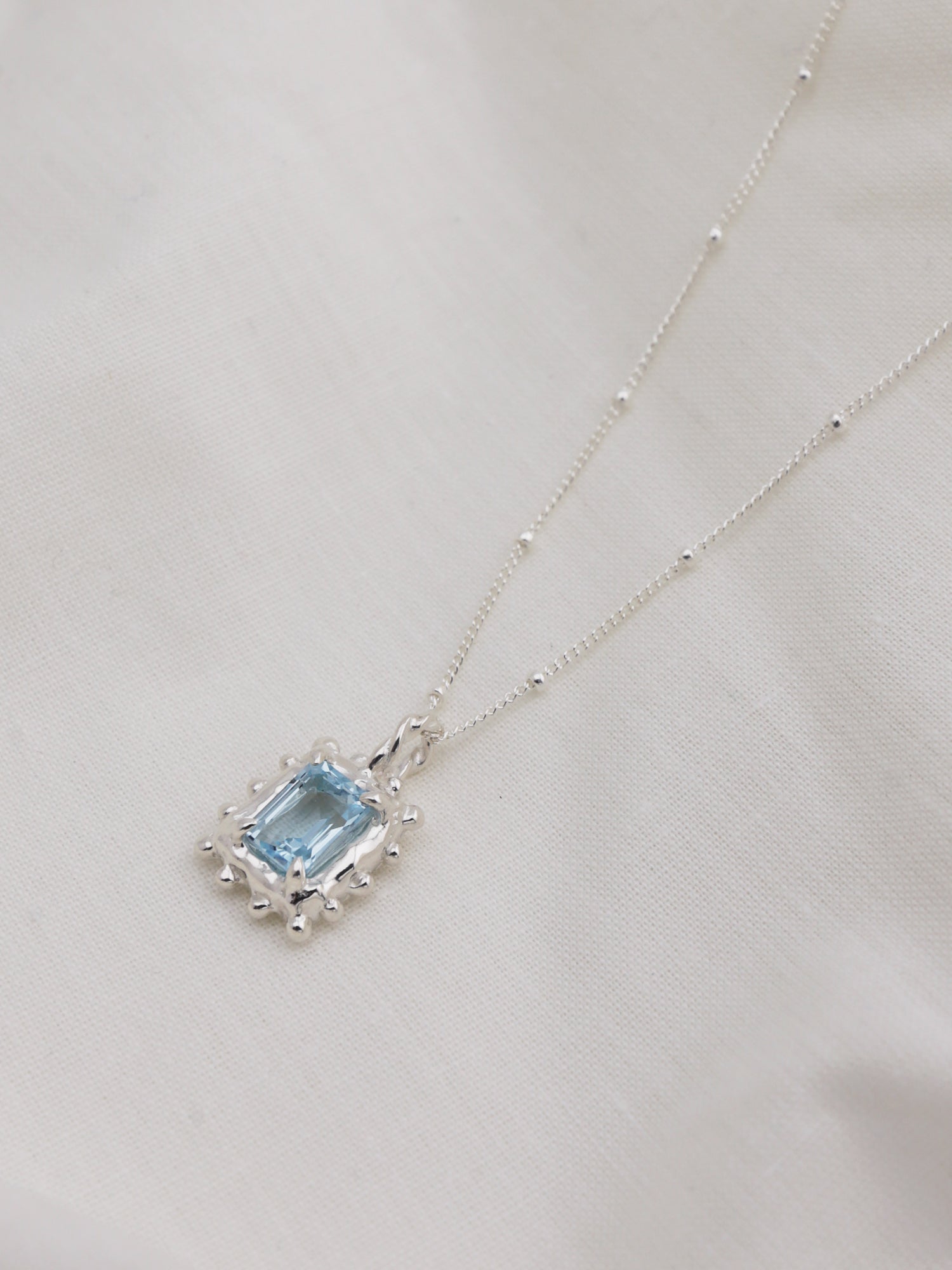 Memento Necklace with Sky Topaz