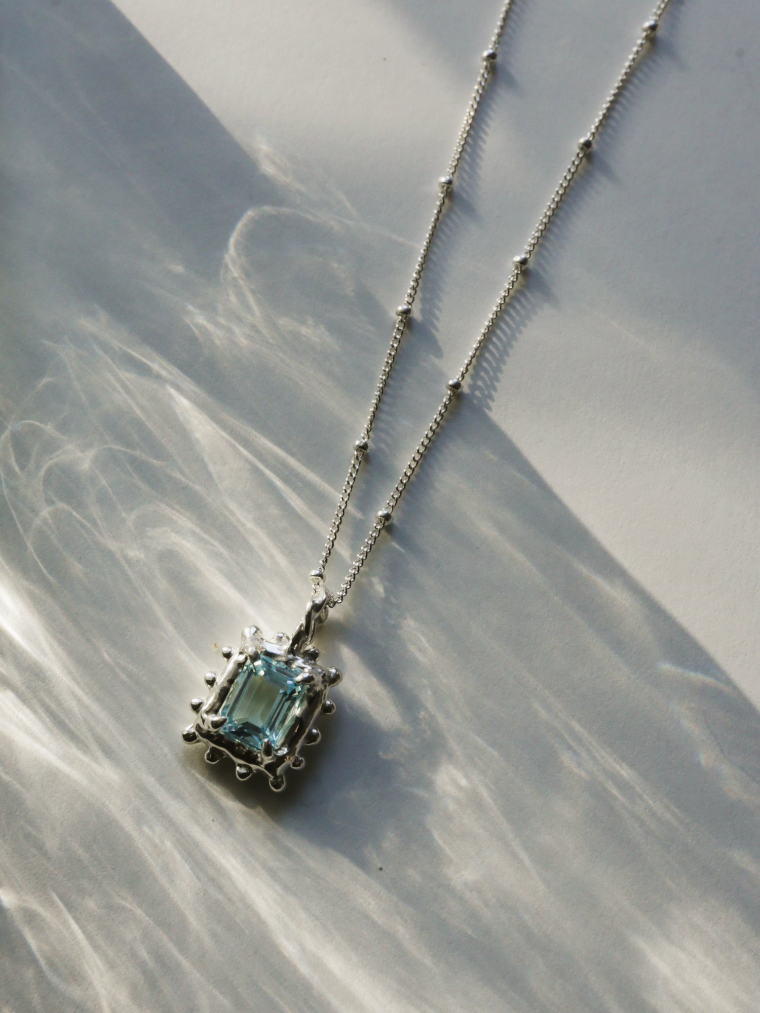 Memento Necklace with Sky Topaz
